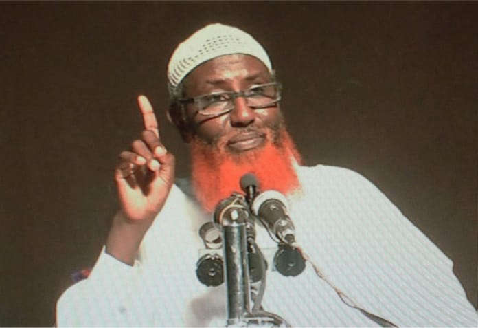 Somali-born cleric Abdulqadir Mumin on computer screen